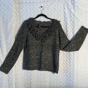 Sweater fringe around V Neck
